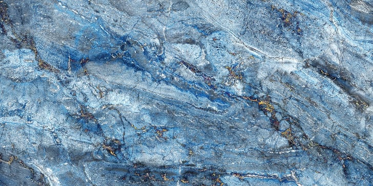 Heavily veined blue marble with white and gold highlights.