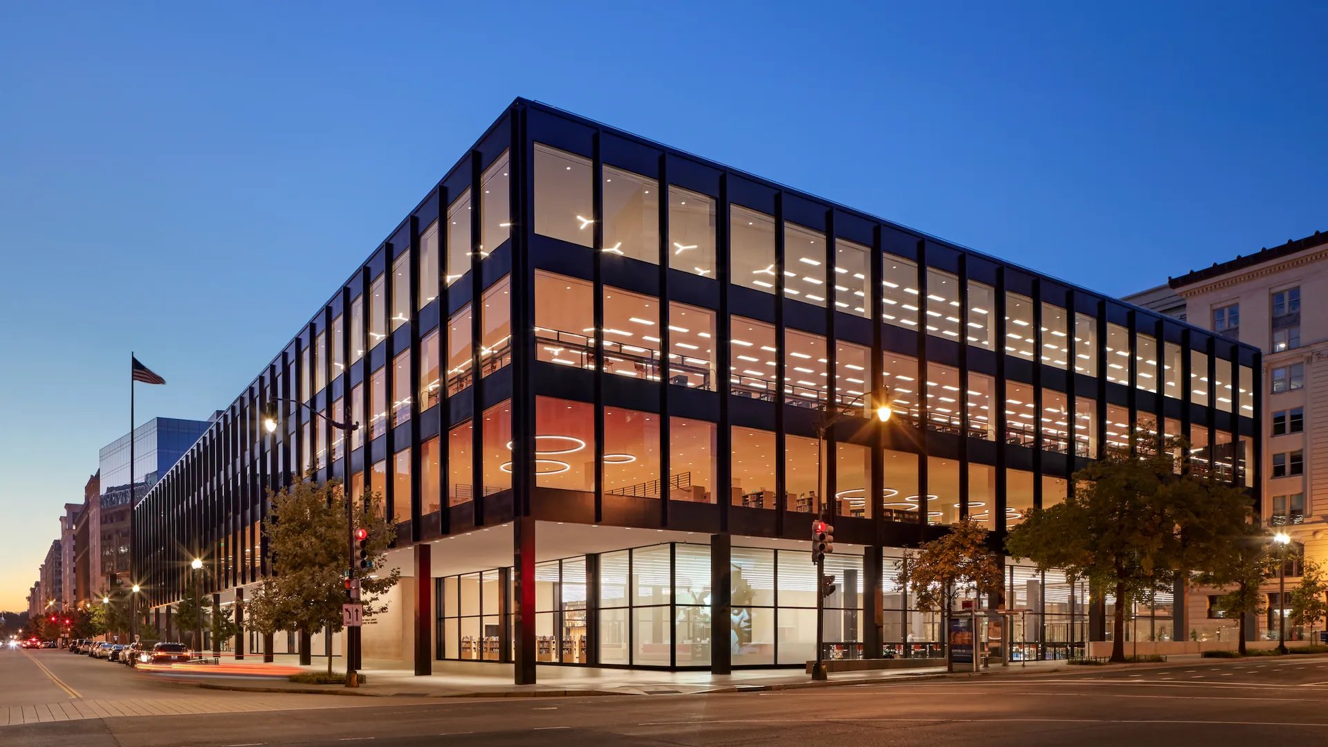 Martin Luther King Jr. Library at dusk with a ton of windows lining the exterior walls for natural light